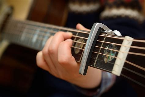 What is Capo in Guitar: A Key to Unlocking Musical Versatility